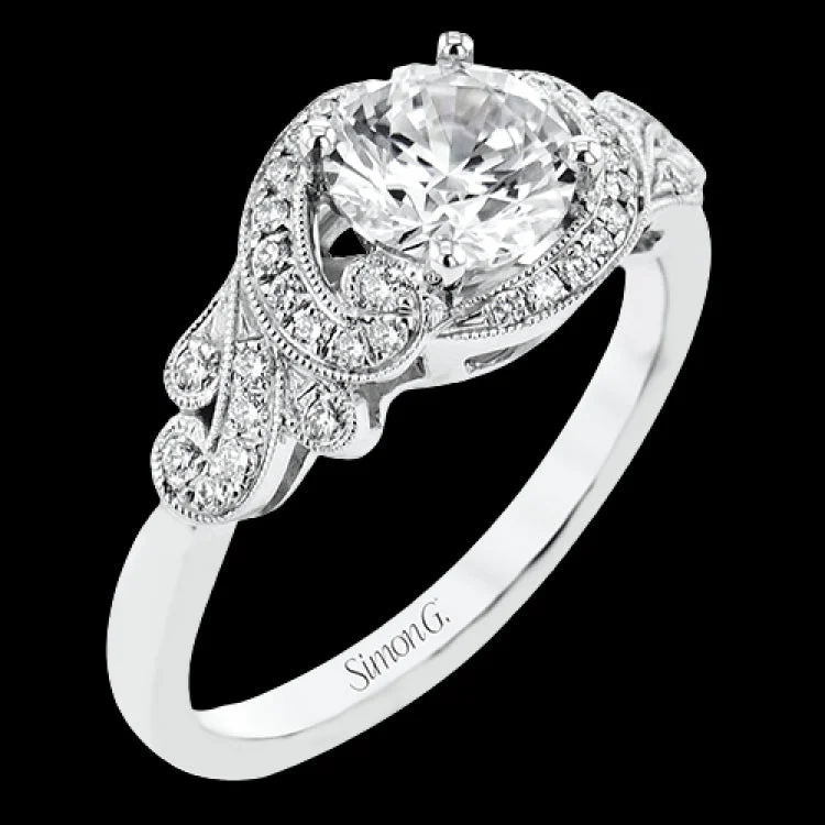 Women’s minimalist engagement rings-A vintage-inspired engagement ring that makes a statement with .20 ctw of white diamonds swirling aroung the center diamond.