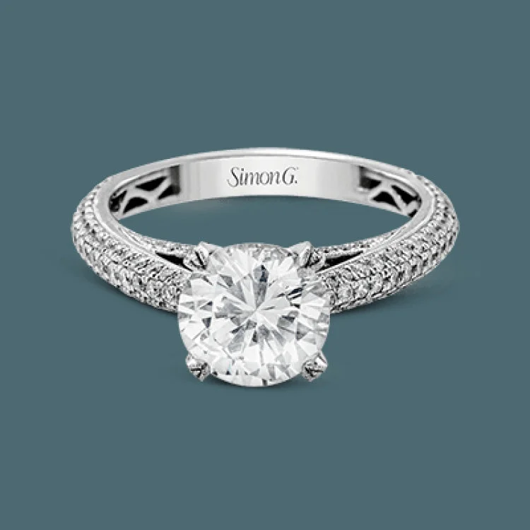 Women’s custom engagement ring designs-This classically styled white gold engagement ring is set with 1.30 ctw of shimmering white diamonds in a stunning design.