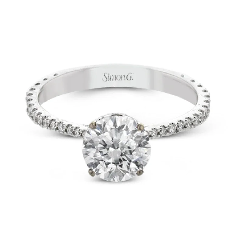 Women’s vintage style engagement rings-This new take on a classic engagement ring setting is part of our Underhalo Collection, where a circle of diamonds sits snugly around the side of the center stone, giving the perfect touch of sparkle from every angle.