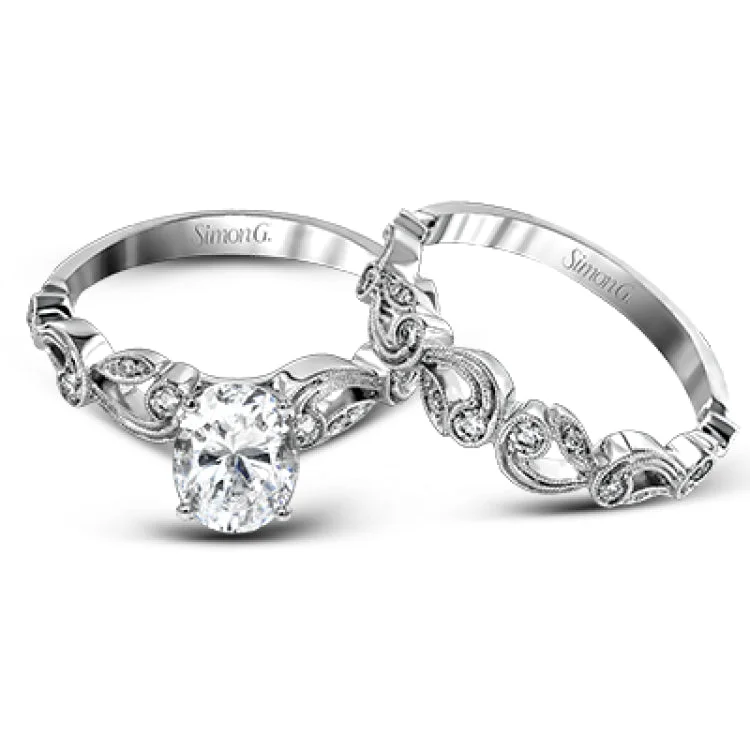 Women’s gold band engagement rings-This beautiful vintage-inspired engagement ring design is built for an oval center stone and contains the perfect touches of .28 ctw of white diamonds in its midst.