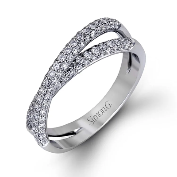 Women’s stackable engagement rings-Presenting an eye-catching modern design, this white gold engagement ring and wedding band are highlighted by 1.45 ctw of round cut white diamonds.