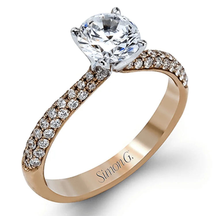 Women’s vintage style engagement rings-The classic design of this white gold engagement ring and wedding band set is emphasized by .72 ctw round cut white diamonds.