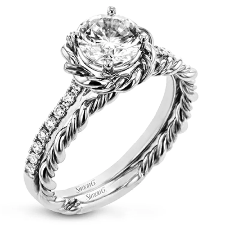 Women’s engagement rings with intricate details-This ring is certainly a twist on a classic, with the band and halo formed from two tones of 18k gold twisted together, and the engagement ring set with .18 ctw of diamonds.