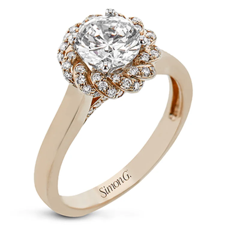 Women’s affordable diamond engagement rings-An 18k engagement ring with a new take on the classic solitaire design, features a twisted diamond halo 0.31 ctw., and high polished yellow band