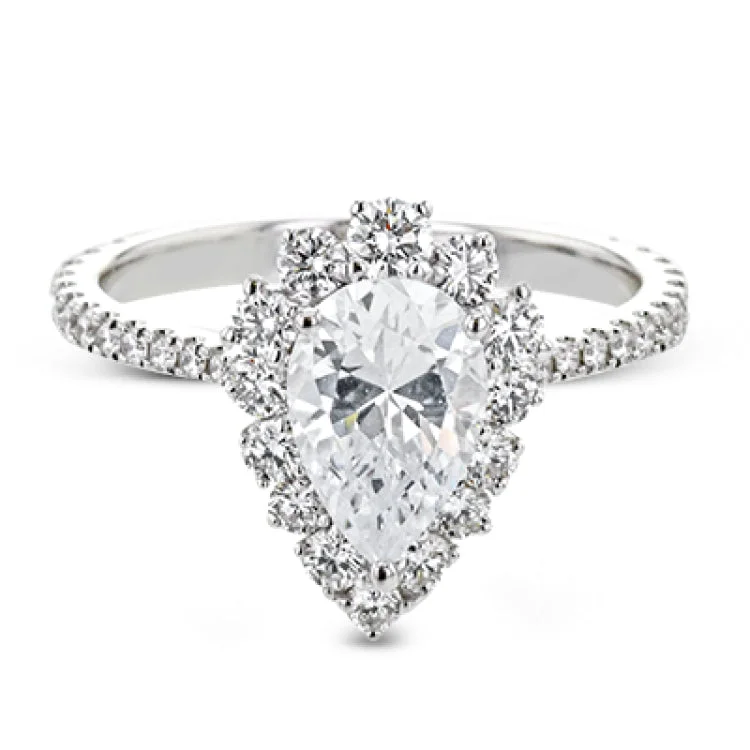 Women’s diamond engagement rings with bands-This Supernova Collection engagement ring is built specially for a pear-shaped center stone, with a wonderful halo of diamonds twinkling like starry skies.