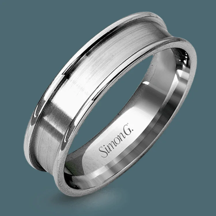 Women’s diamond band engagement rings-This modern men's wedding band features both rose and white gold in a contemporary design.