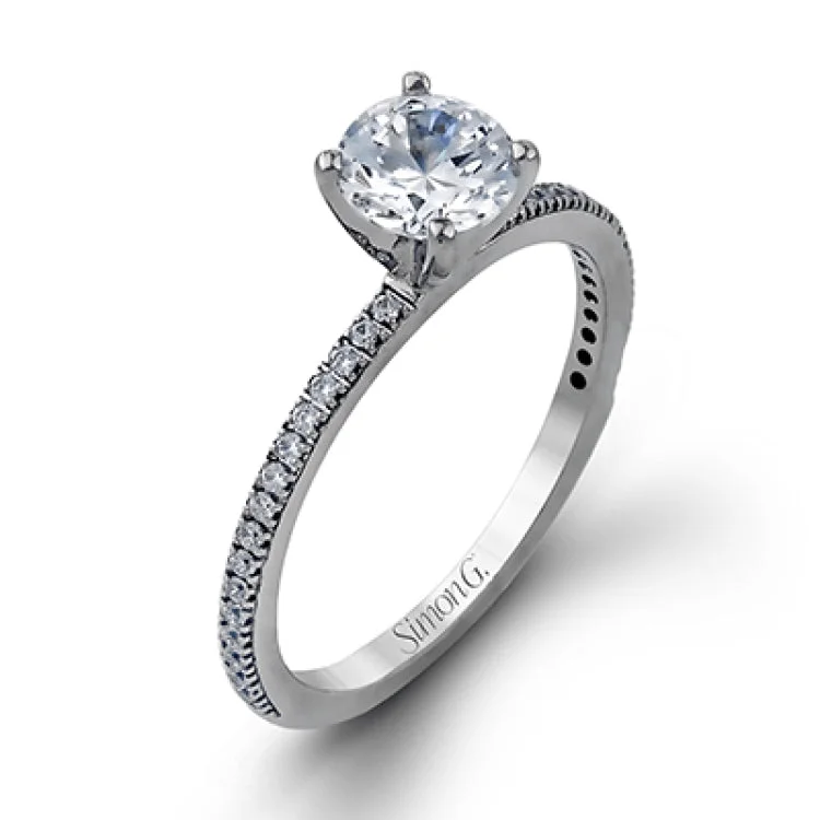 Women’s titanium engagement rings-The classic, streamlined design of this 18k white gold wedding set is accented by .30 ctw of sparkling white round brilliant diamonds.