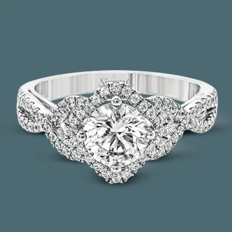 Women’s cushion cut engagement rings-Set with .35 ctw of arresting round cut white diamonds, this lovely white gold engagement ring features a memorable intertwined design on the band.