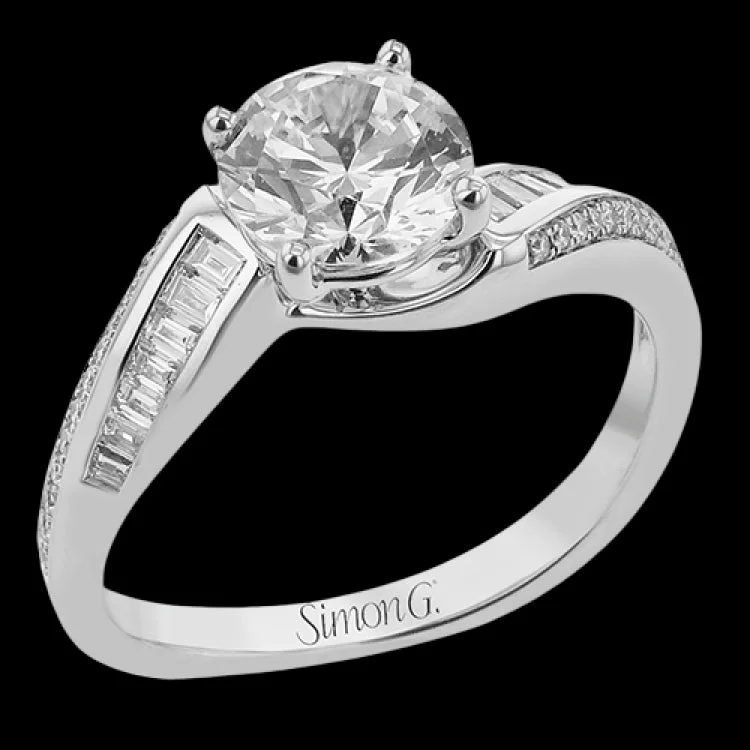 Women’s engagement rings with colored stones-This 18K white gold engagement ring has an art deco quality with its swirl band design accented with rows of tapered baguettes 0.20 ctw., and RD diamonds 0.09 ctw.