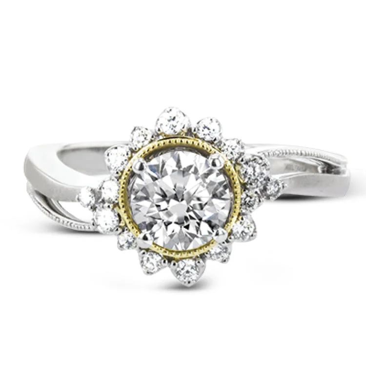 Women’s luxury engagement rings-Full of interesting design details, this engagement ring from our Supernova collection features a yellow gold milgrain halo around the center stone, and an outer halo set with .20 ctw of white diamonds.