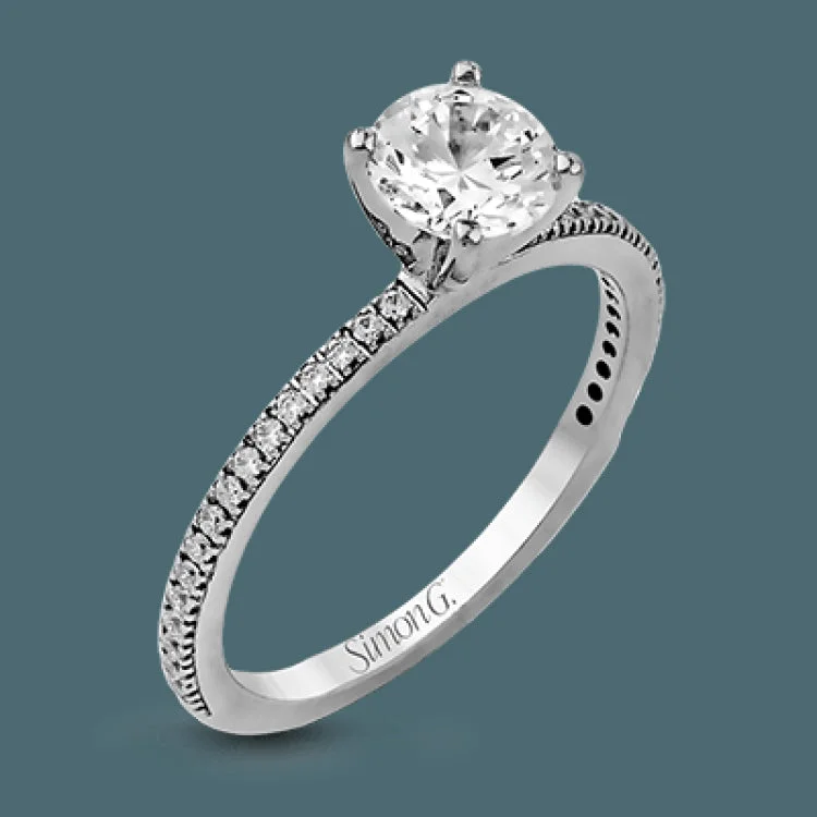 Women’s custom-designed engagement rings-The classic, streamlined design of this 18k white gold wedding set is accented by .30 ctw of sparkling white round brilliant diamonds.