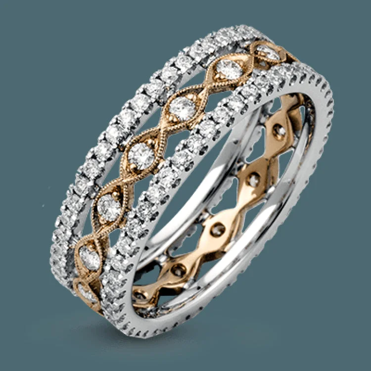 Women’s engagement rings with a royal touch-This wonderful 18k gold band features .87 ctw of white diamonds set into an intricate, three layer design.  It can be worn on its own as a fashion statement or function as a wedding band.