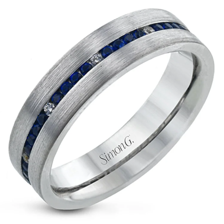 Women’s custom gemstone engagement rings-A striking men's wedding band in 14K white gold has a brushed finish and a row of sapphires 0.60 ctw., sprinkled with white diamonds 0.10 ctw.