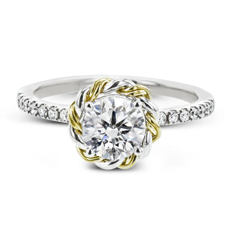 Women’s three-stone diamond engagement rings-This ring is certainly a twist on a classic, with the band and halo formed from two tones of 18k gold twisted together, and the engagement ring set with .18 ctw of diamonds.