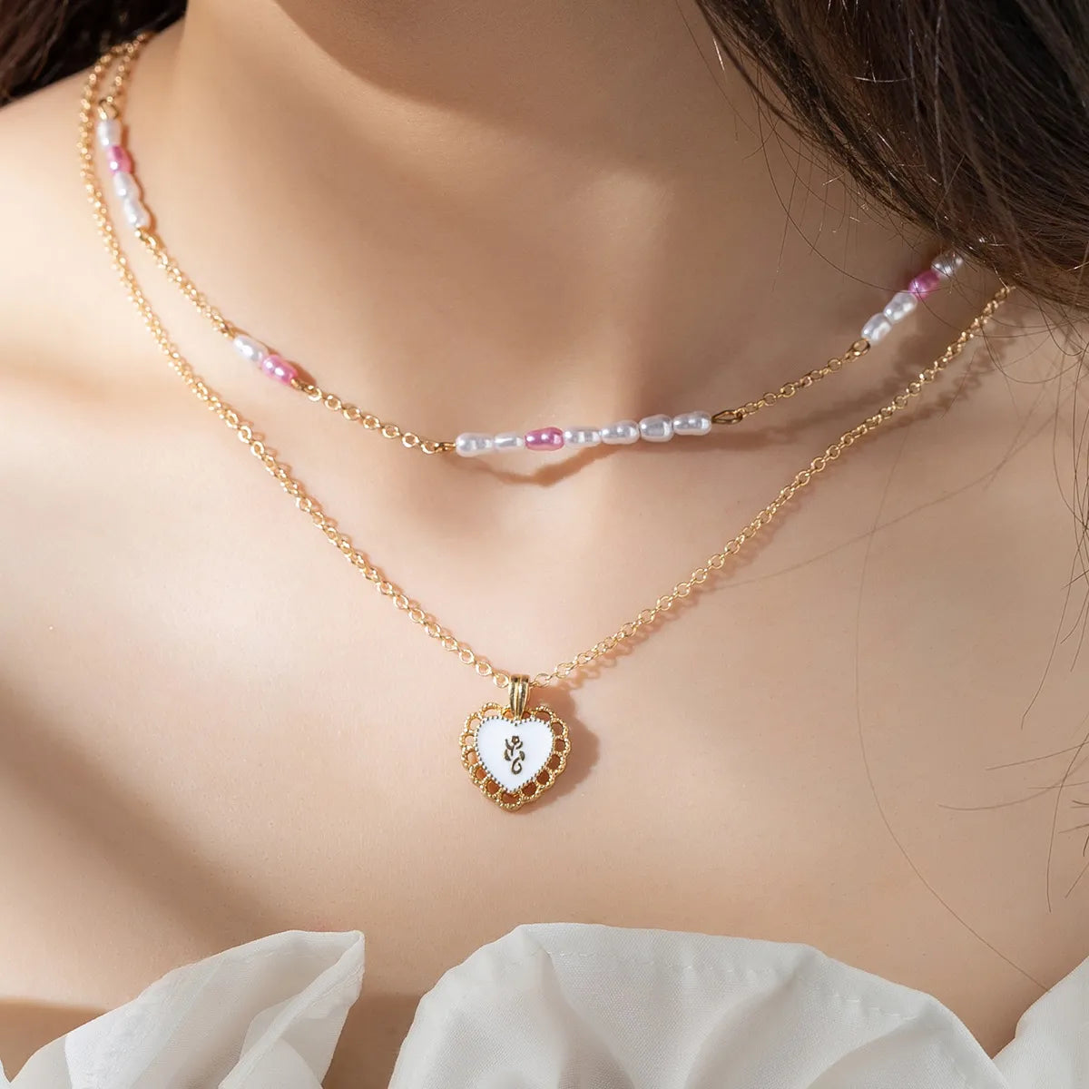 Women’s sapphire necklaces-Wholesale Elegant Heart Shape Stainless Steel Artificial Pearl Gold Plated Layered Necklaces