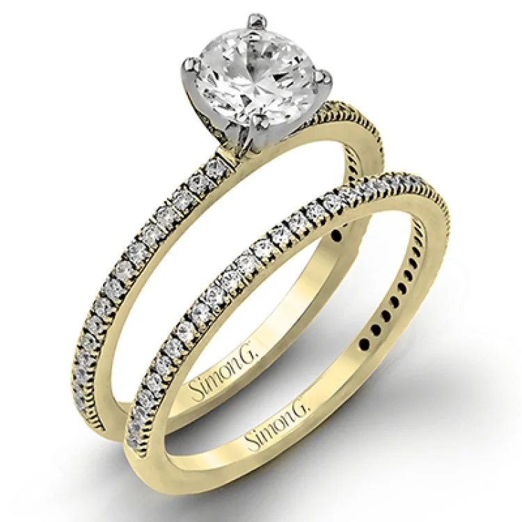 Women’s designer engagement rings-The classic, streamlined design of this 18k white gold wedding set is accented by .30 ctw of sparkling white round brilliant diamonds.