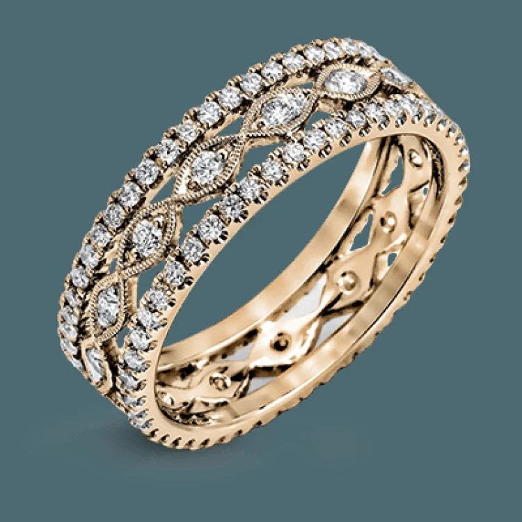 Women’s engagement rings with a romantic touch-This wonderful 18k gold band features .87 ctw of white diamonds set into an intricate, three layer design.  It can be worn on its own as a fashion statement or function as a wedding band.