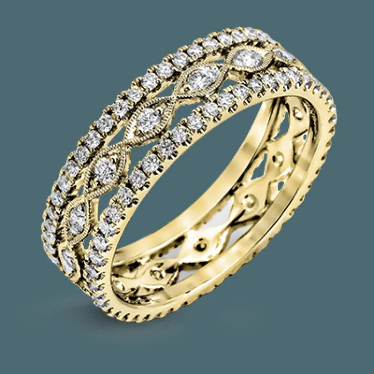 Women’s bespoke engagement rings-This wonderful 18k gold band features .87 ctw of white diamonds set into an intricate, three layer design.  It can be worn on its own as a fashion statement or function as a wedding band.