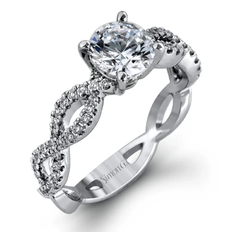 Women’s affordable platinum engagement rings-The intricate twisted design of this modern white gold engagement ring and wedding band set is set with .65 ctw of striking round cut white diamonds.