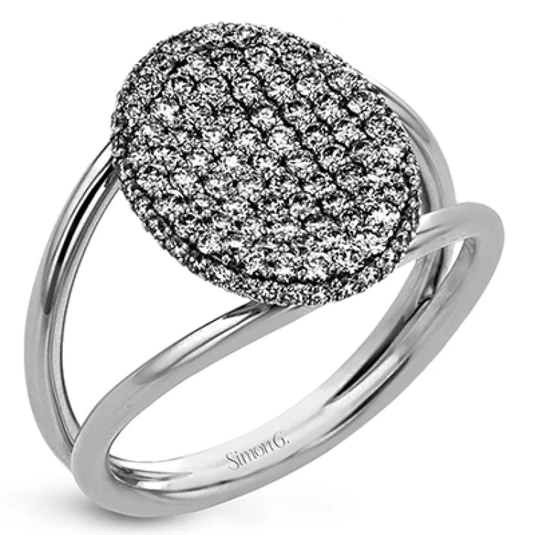 Women’s engagement rings with diamonds-Rows of diamonds create a stunning effect in this 18k white gold engagement ring made for a round diamond. A total of .65ctw of white diamonds surround the center stone.