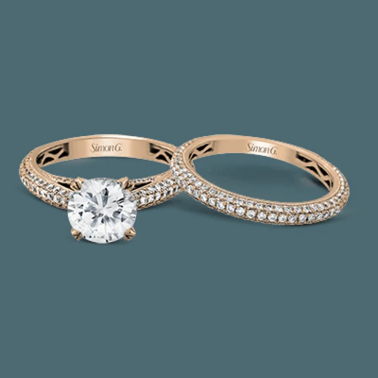 Women’s gold engagement rings-This classically styled white gold engagement ring is set with 1.30 ctw of shimmering white diamonds in a stunning design.