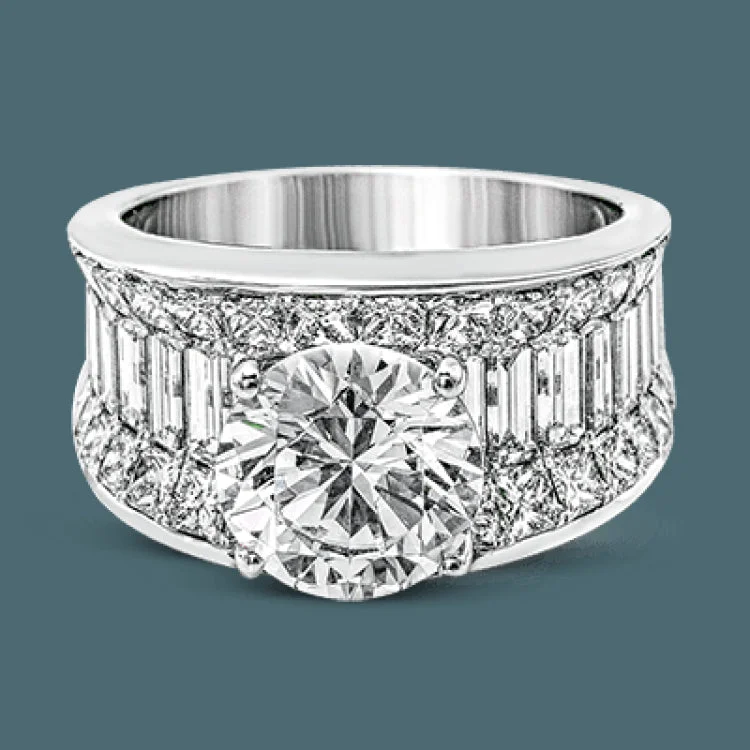 Women’s solitaire engagement rings-Dramatic and bold, this white gold contemporary engagement ring is accented by 1.87 ctw princess cut white diamonds and 1.67 ctw glistening baguette white diamonds.