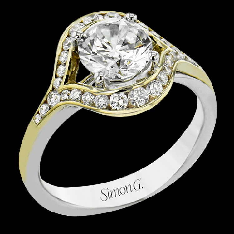 Women’s sapphire and diamond engagement rings-This modern two-tone engagement ring features a uniquely shaped halo with round diamonds of 0.39 ctw.