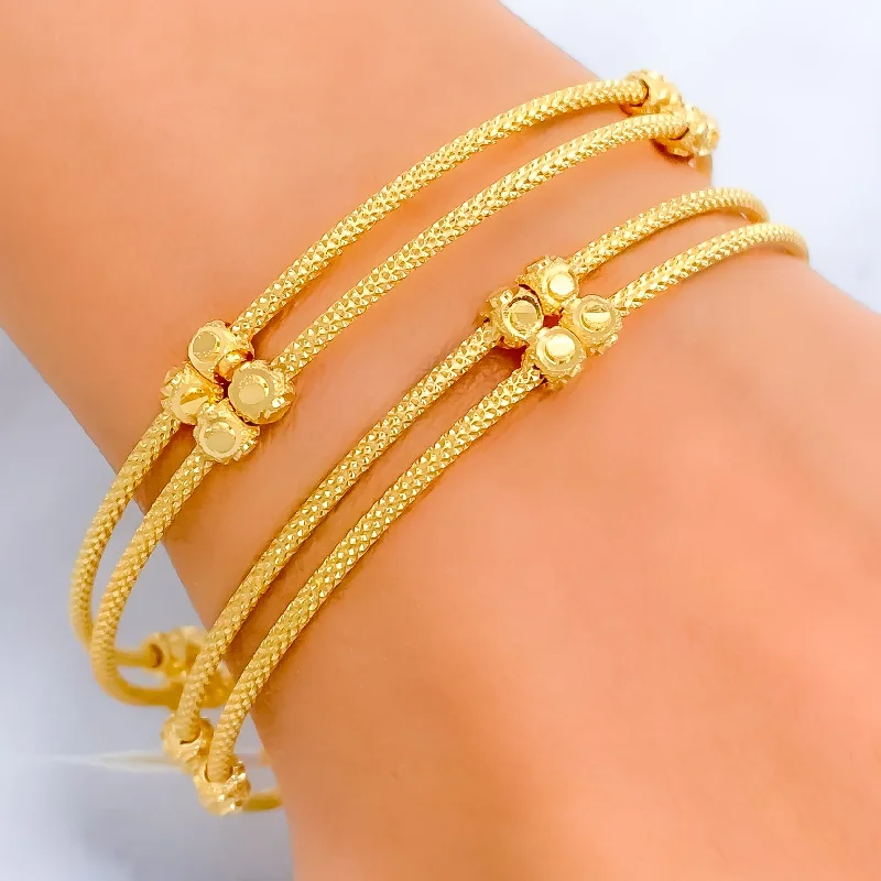 Women’s minimalist bangles-Modish Fancy Orb 22k Gold Bangle Pair