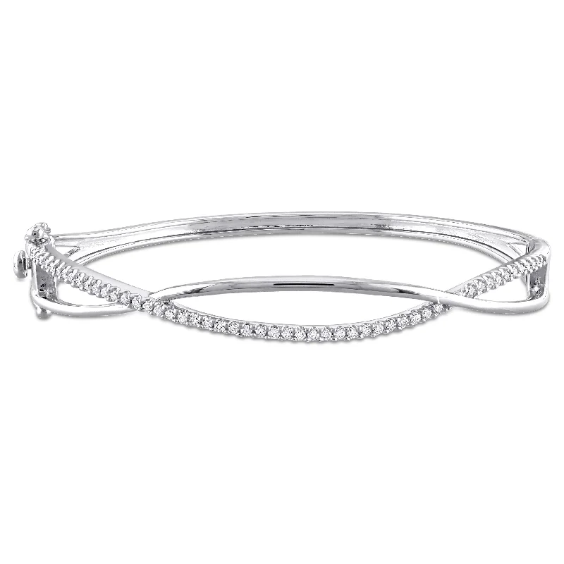 Women’s heart-shaped bracelets-Miadora 1/2ct DEW Created Moissanite Criss-Cross Bangle in Sterling Silver