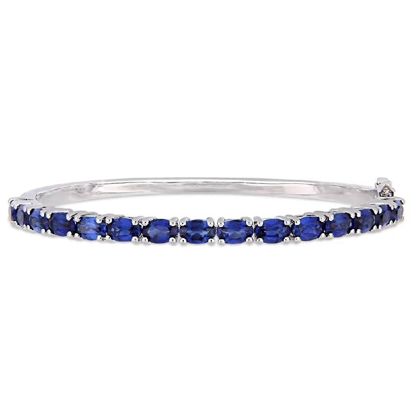 Women’s stylish bracelets-Miadora Sterling Silver 8 1/4ct TGW Created Blue Sapphire Semi-Eternity Bangle